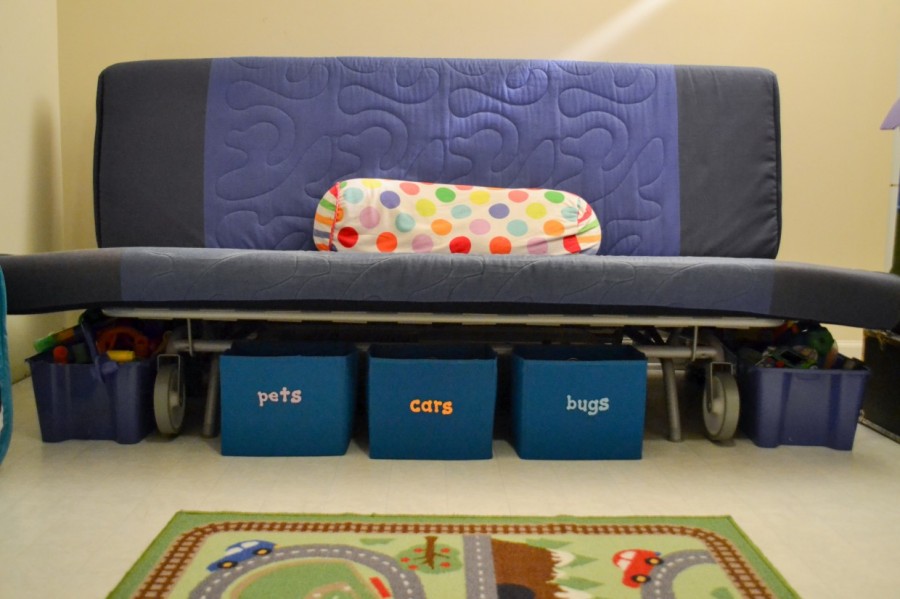 BLUE FUTON WITH BLUE LABELED BINS