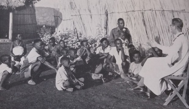 Priest Teaching Youth